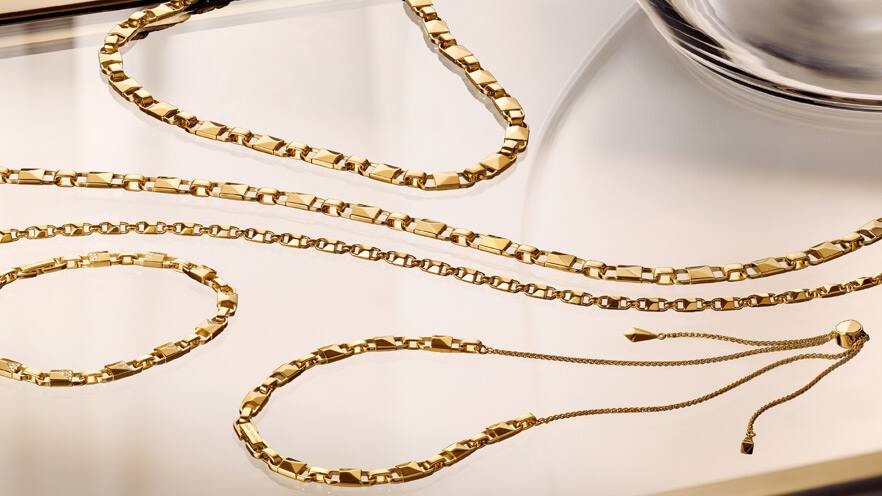 Timeless Mercer link designs inspired by the signature Michael Kors Mercer lock